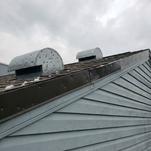 Metal Roof & Flashing Damage